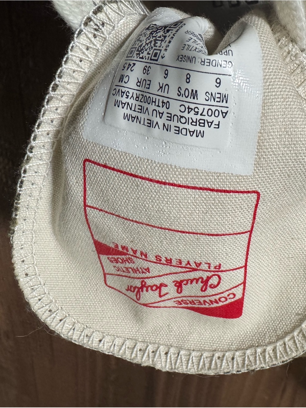 Converse Off-White Canvas Sneaker with Red Logo Print